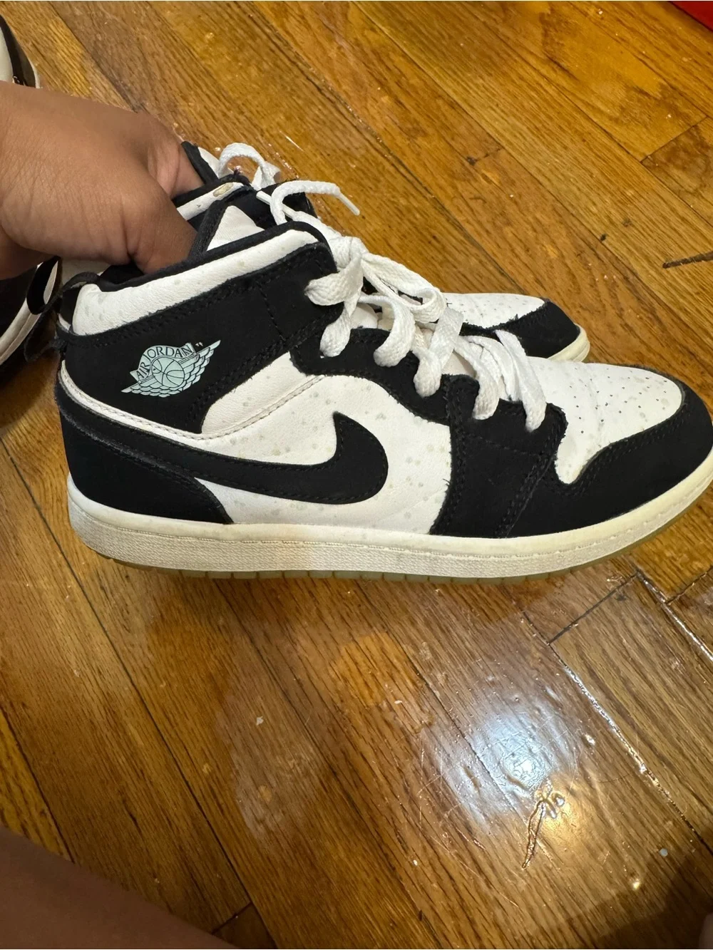 Air Jordan Black and White High Top Sneakers